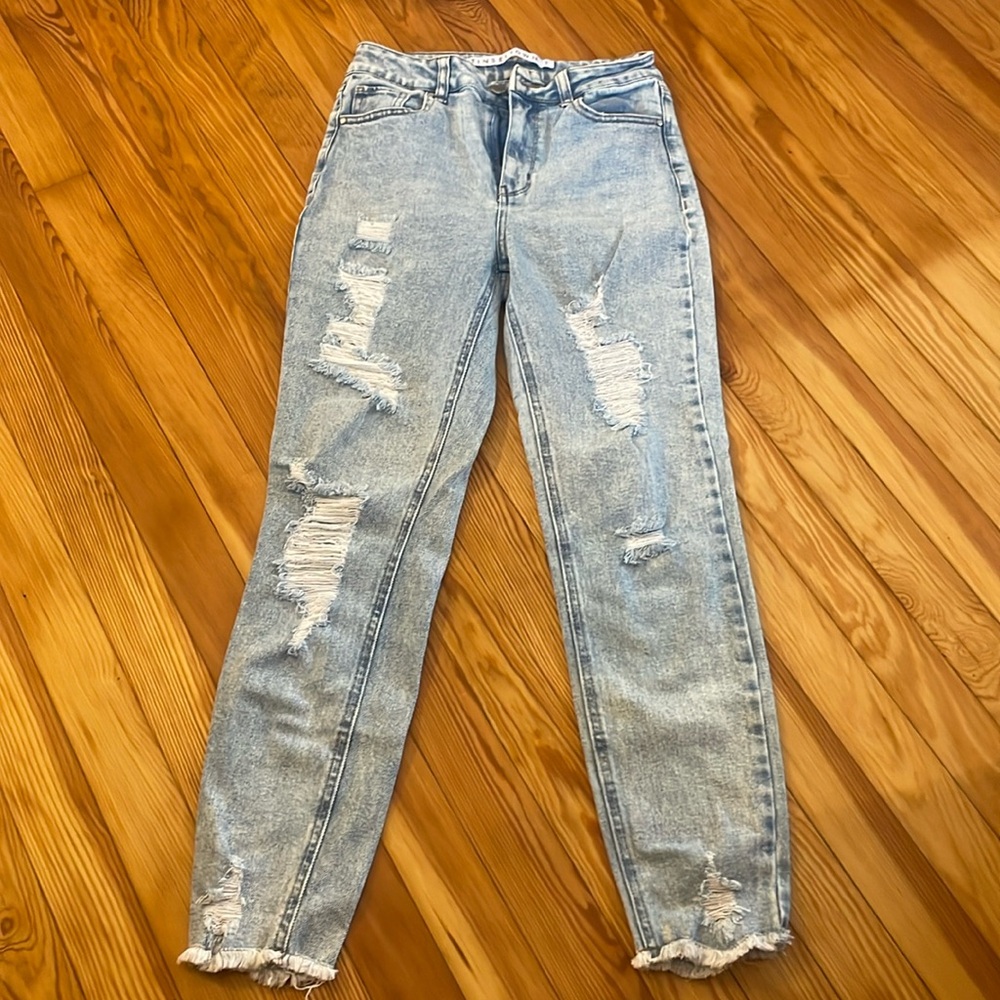 High rise Light wash ripped jeans with raw hem size 3